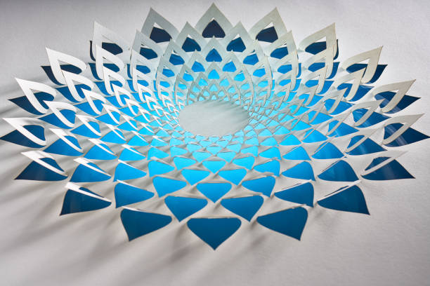 istock Intricate Floral Mandala Paper Cut Artwork with Blue Gradient Petals on White Background, Abstract Design Close-Up 2183538153