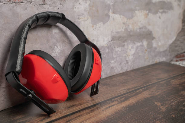 istock Red earphones Used on construction site 2183540385