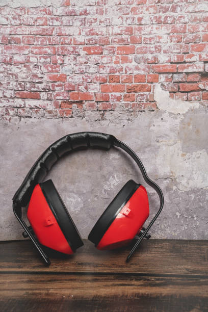 istock Red earphones Used on construction site 2183540420