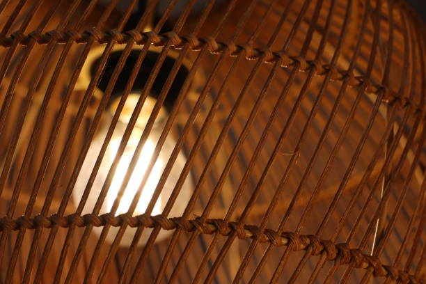 istock An Elegant Rattan Lamp That Emits a Soft and Inviting Glow, Perfect for Creating Ambiance 2183541184