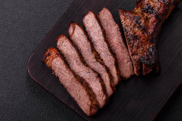 istock Grilled wagyu beef tomahawk steak with salt, spices and herbs 2183543617