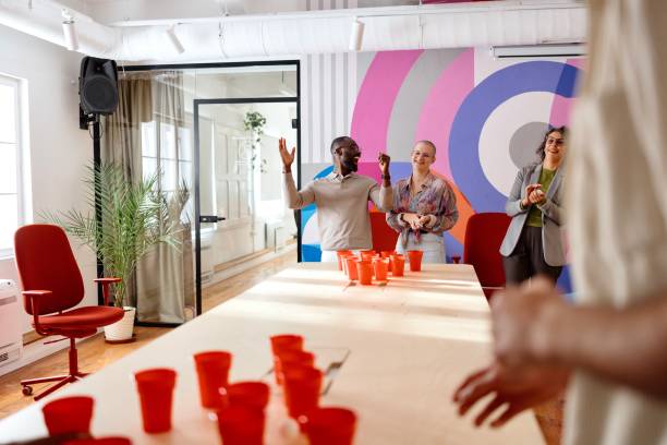 istock Beer pong in the office 2183548707