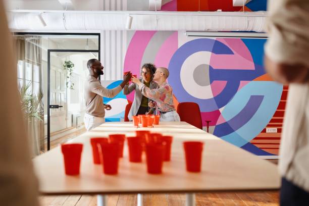 istock Colleagues having fun after hours in the office 2183548769