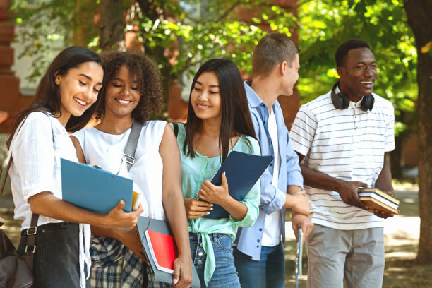 istock Group of international students resting in campus during break in classes 2183552449