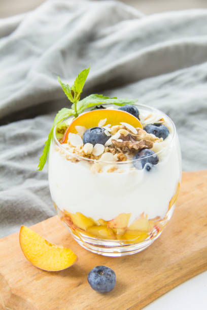 istock Healthy blueberry, peach and walnut parfait 2183555998