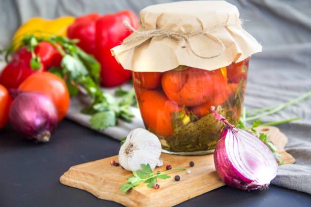 istock Jars of tasty pickled vegetables on a table 2183556149