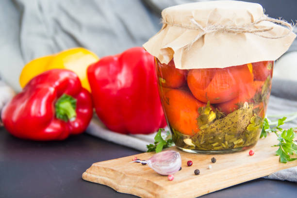 istock Jars of tasty pickled vegetables on a table 2183556369