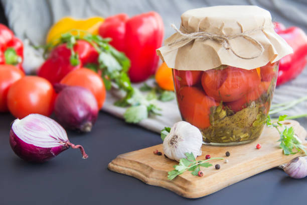 istock Jars of tasty pickled vegetables on a table 2183568990