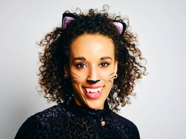 istock Woman With a Cat Costume 2183569911