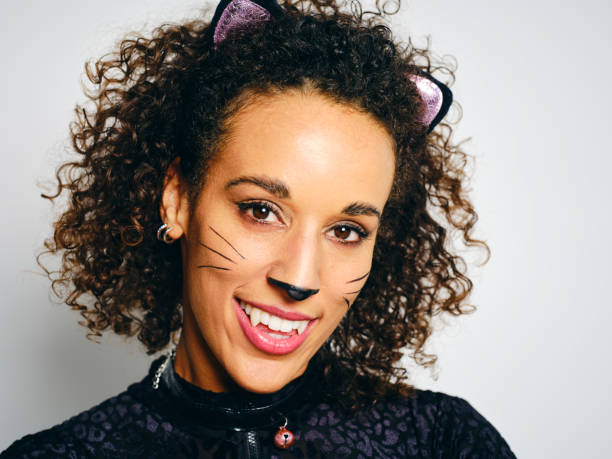 istock Woman With a Cat Costume 2183569973