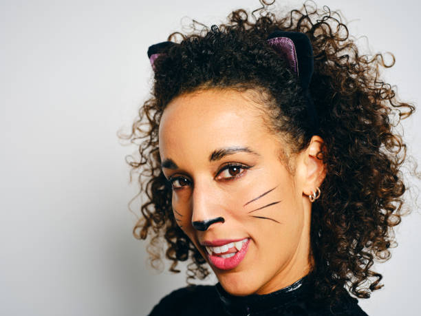 istock Woman With a Cat Costume 2183569980