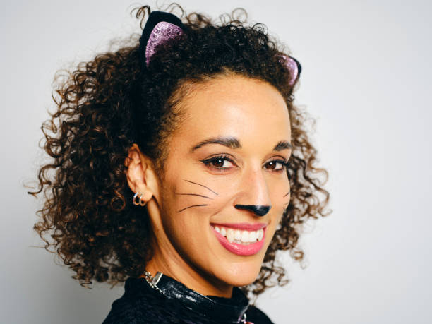 istock Woman With a Cat Costume 2183569988