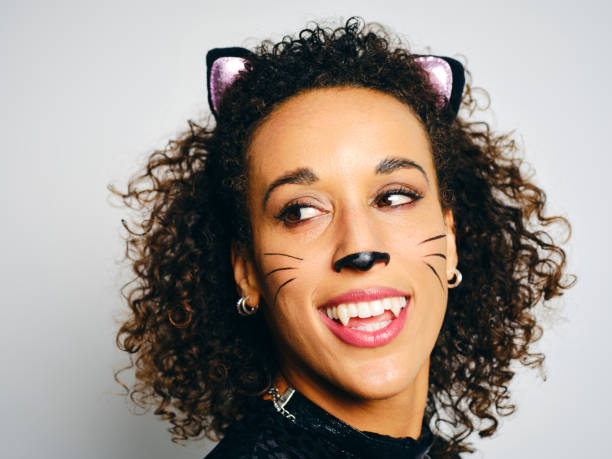 istock Woman With a Cat Costume 2183570004