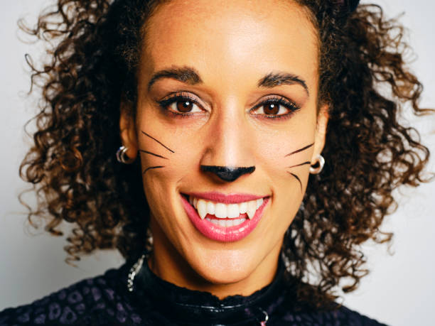 istock Woman With a Cat Costume 2183570009