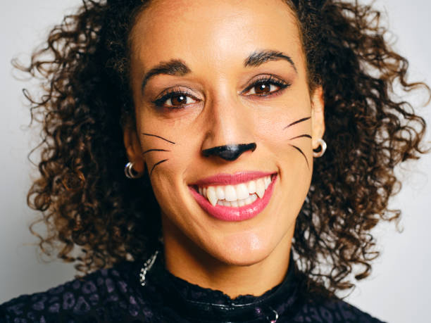 istock Woman With a Cat Costume 2183570014