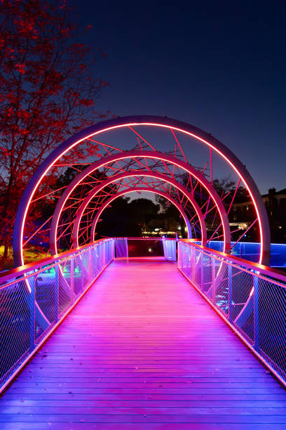 istock Vibrant Lighted Skywalk in Downtown Cary Park at Dusk 2183571655