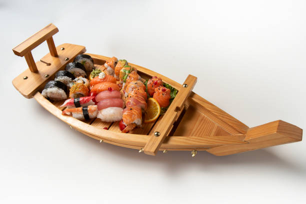 istock boat-shaped kelunis plate with sushi food 2183573818