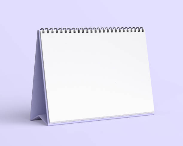 istock Empty desk calendar mockup on light purple background. 2183577141