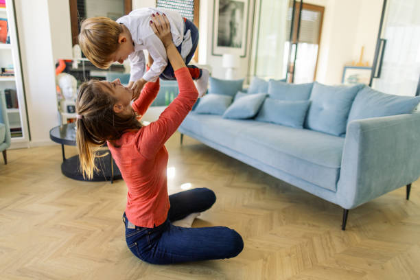 istock Mom and son playing together 2183577346