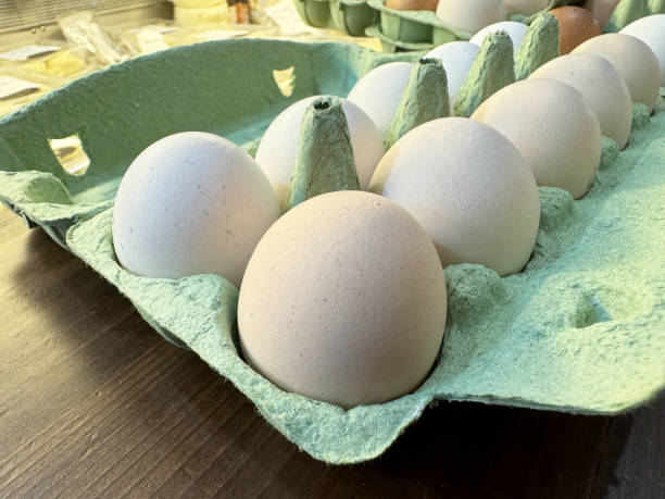 istock Fresh organic eggs on wooden table 2183578788