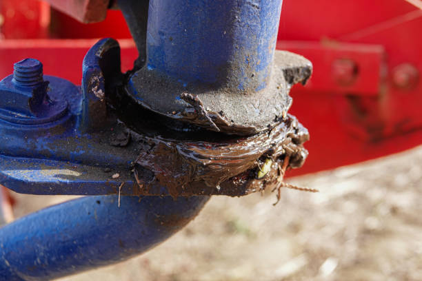 istock dirty oil grease on mechanism joints 2183579835