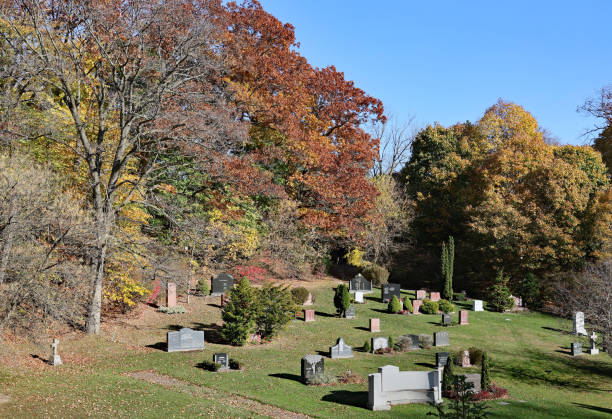 Toronto, Canada - November 7, 2024:  Mount Pleasant cemetery in Toronto has a park-like appearance that is quite beautiful in fall