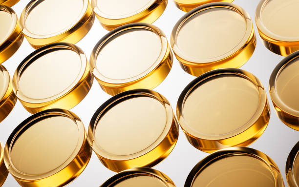 istock Transparent golden glass coins background, 3d rendering. 2183592019