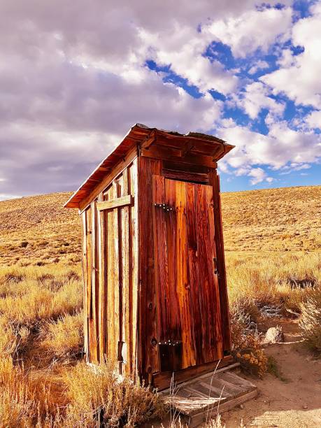 istock Outhouse in remote location 2183604295