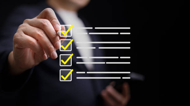 istock A man is drawing a check box on a screen with a yellow border 2183604364