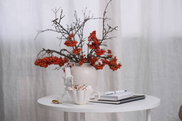 istock A Cozy Coffee Setup Featuring Beautiful Autumn Decor, Notebooks, and a Relaxing Atmosphere 2183605459