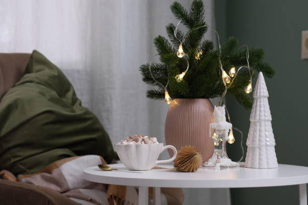 istock Create Cozy Holiday Decor with Lush Greenery and Soft Textures to Enhance Your Space 2183605814