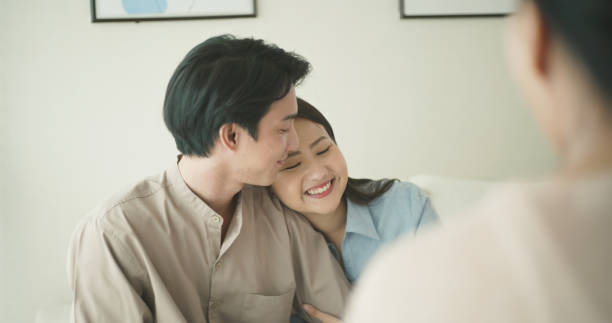 istock Happy Couple Engaging in Warm Conversation Together at Home. 2183606150