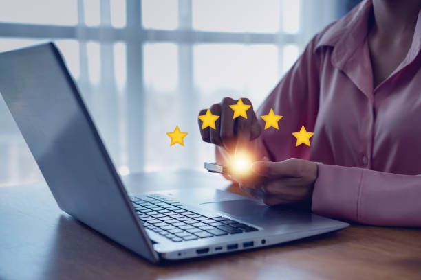 istock Giving a five star rating. Service rating, satisfaction concept.  Customer evaluation feedback, Giving Positive Review for Client's Satisfaction Surveys. 2183608424