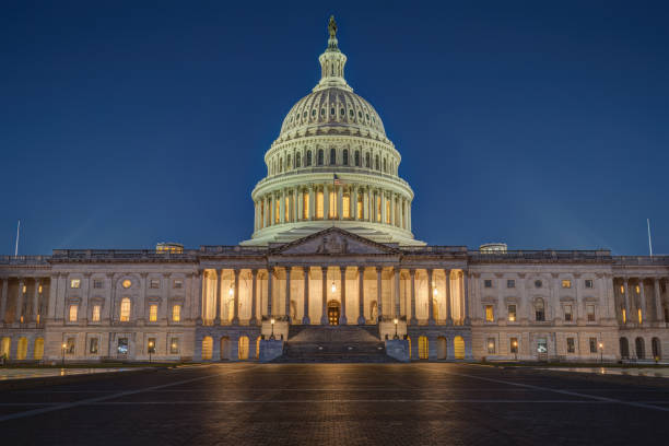 istock The illuminated United States Capitol at night 2183610443