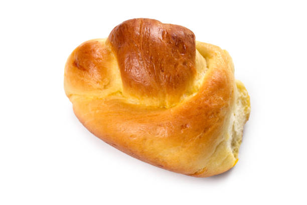 Sweet homemade bun on a white background.