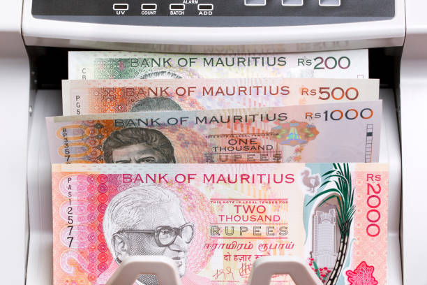 istock Mauritian rupee in the counting machine 2183613418