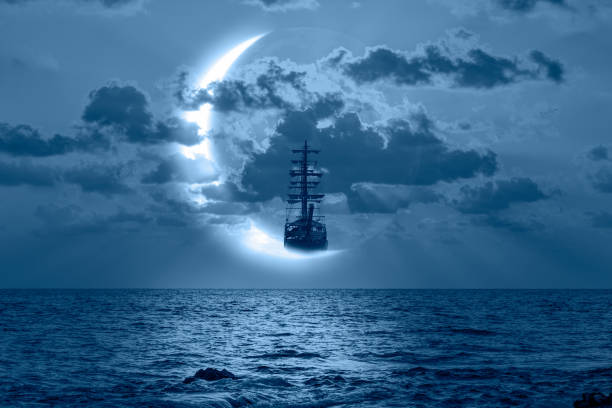 istock Fantasy background - Old ship flying over stormy clouds with crescent moon 2183614556