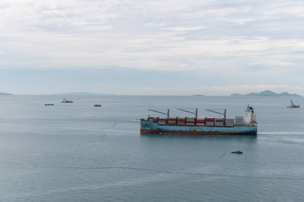 istock container ship commercial vessel alongside in port for loading and discharging containers services in maritime transports in World wide logistics 2183616698