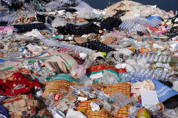 istock Lots of garbage have fallen on the dirty lake 2183617411