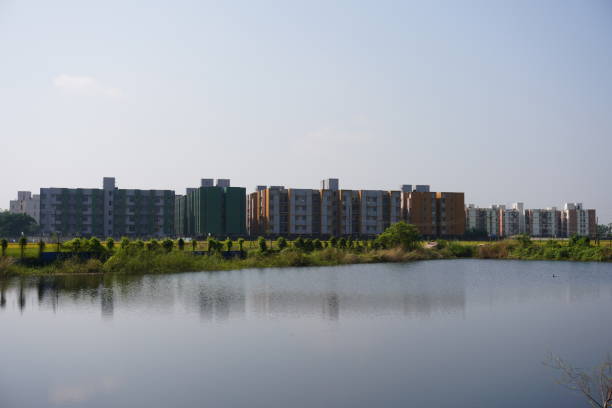 istock Hi-tech modern city beside the lake 2183617518