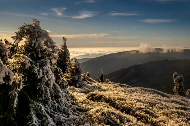 istock View from mountain range to the valley above fog and clouds 2183624716