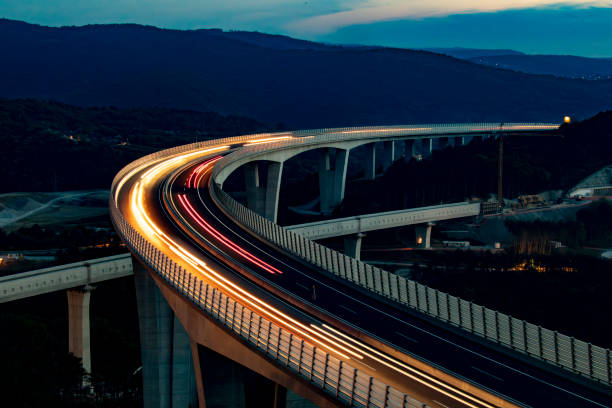 Nighttime Traffic Flowing Across Expansive Viaduct