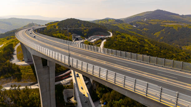 istock Aerial View of Traffic Flowing on Expansive Viaduct 2183626423
