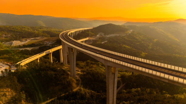 istock Sunset Vista Over Expansive Viaduct with Traffic 2183626444