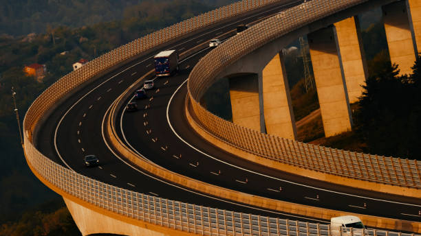 istock Sunset Hues Over Traffic-Flowing Viaduct 2183626508