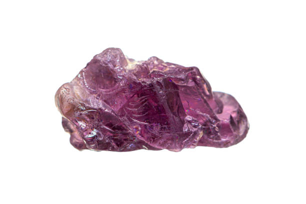 Natural purple-violet Spinel on white background
