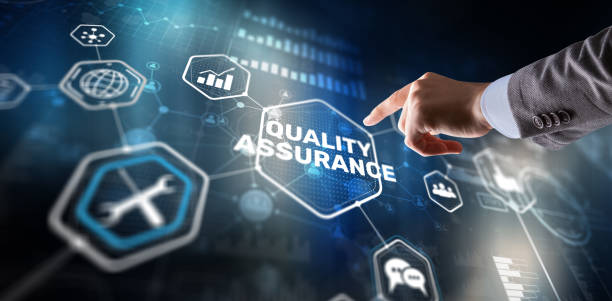istock QA Businessman pressing Quality assurance button on virtual screens 2183626737