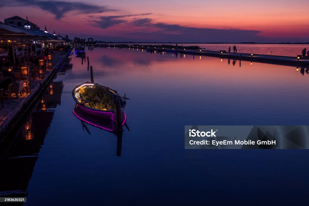 Boats Moored On Sea Against Sky During Sunset Photo taken in Lefkáda, Greece Beauty In Nature Stock Photo Boats Moored On Sea Against Sky During Sunset Photo taken in Lefkáda, Greece Beauty In Nature Stock Photo