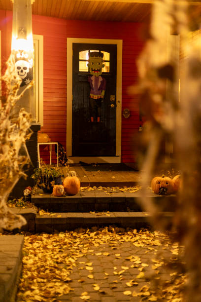istock The house is adorned with pumpkins and cobwebs 2183638154