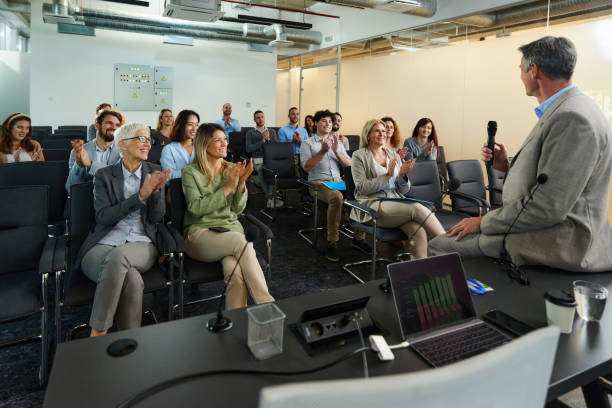 istock Applauding on successful seminar in board room! 2183647257